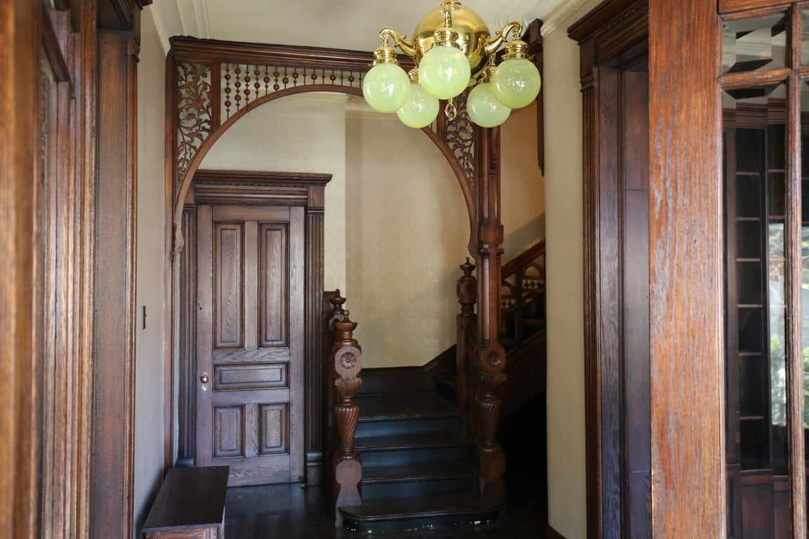 one of several matching original varnished oak wood interior residential passage doors salvaged from an 1880's chicago mansion