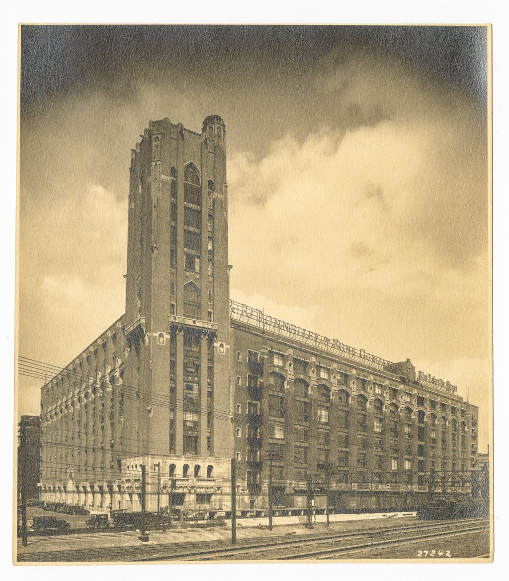c. 1920's 24-karat gold glazed ornamental terra cotta r.r. donnelley printing plant exterior facade shield with hand trowel