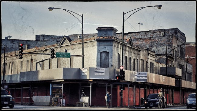 worn and weathered intact solid walnut pre-fire chicago interior commercial building newel post with a nicely turned and tapered profile