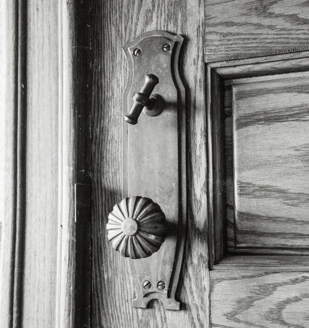 original john root-designed kansas city board of trade building (kbot) cast iron doorknob and matching backplate with largely intact bower-barff finish