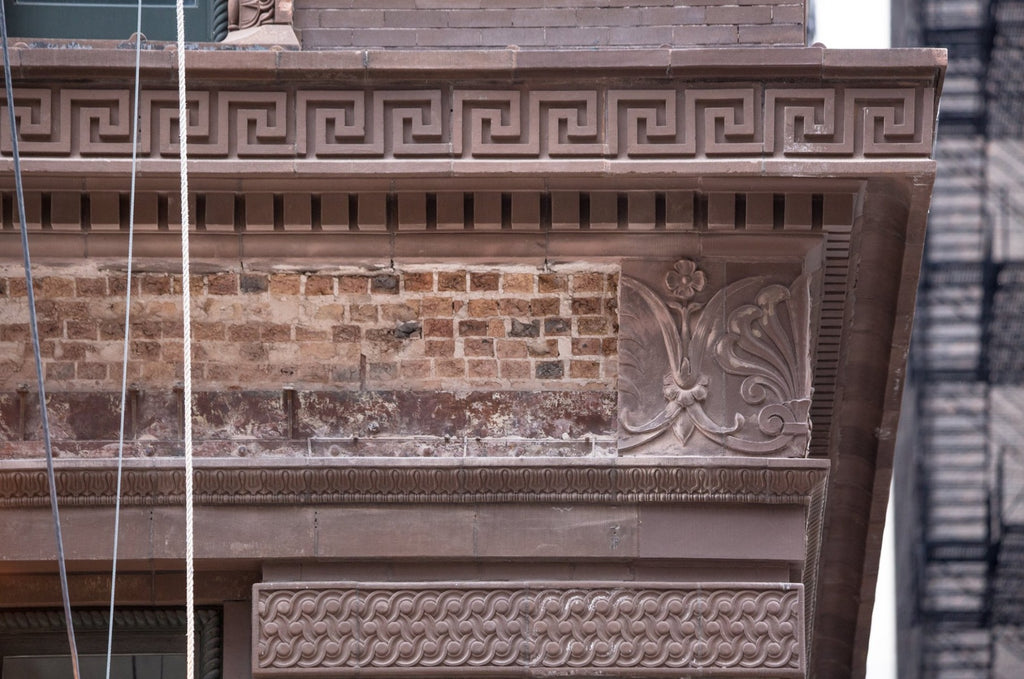 faithfully recast martin roche-designed marquette building terra cotta panel fabricated for building's restoration in 2019