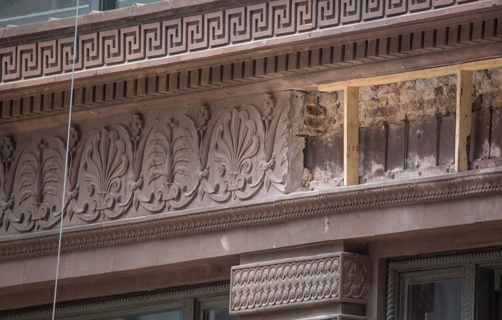 faithfully recast martin roche-designed marquette building terra cotta panel fabricated for building's restoration in 2019