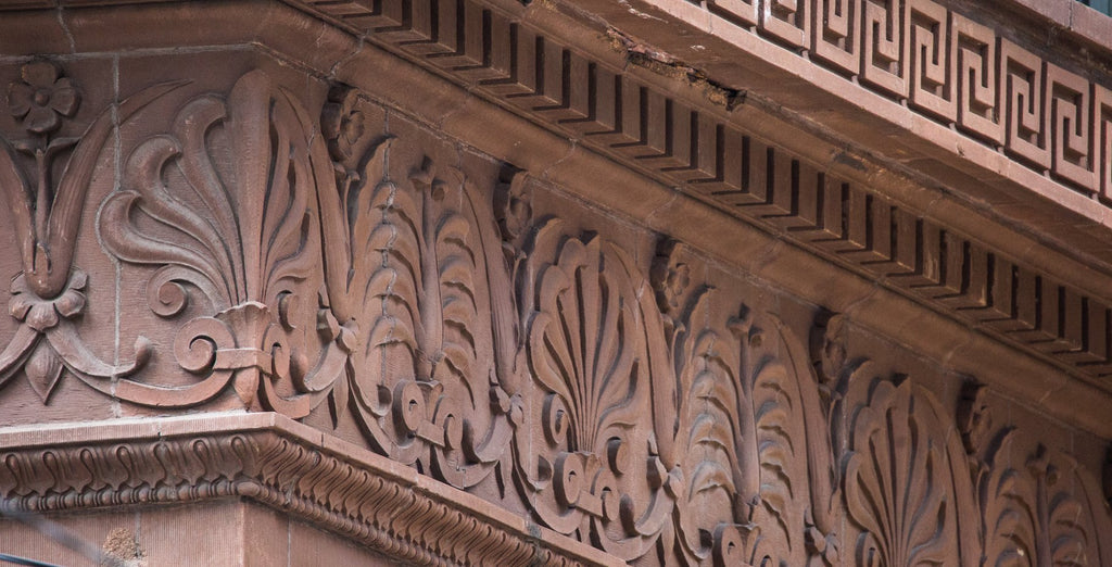 faithfully recast martin roche-designed marquette building terra cotta panel fabricated for building's restoration in 2019