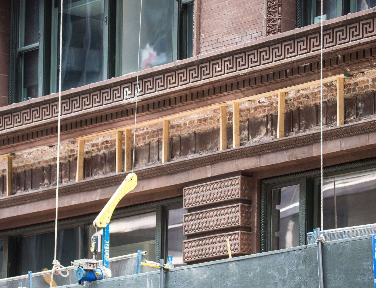 faithfully recast martin roche-designed marquette building terra cotta panel fabricated for building's restoration in 2019