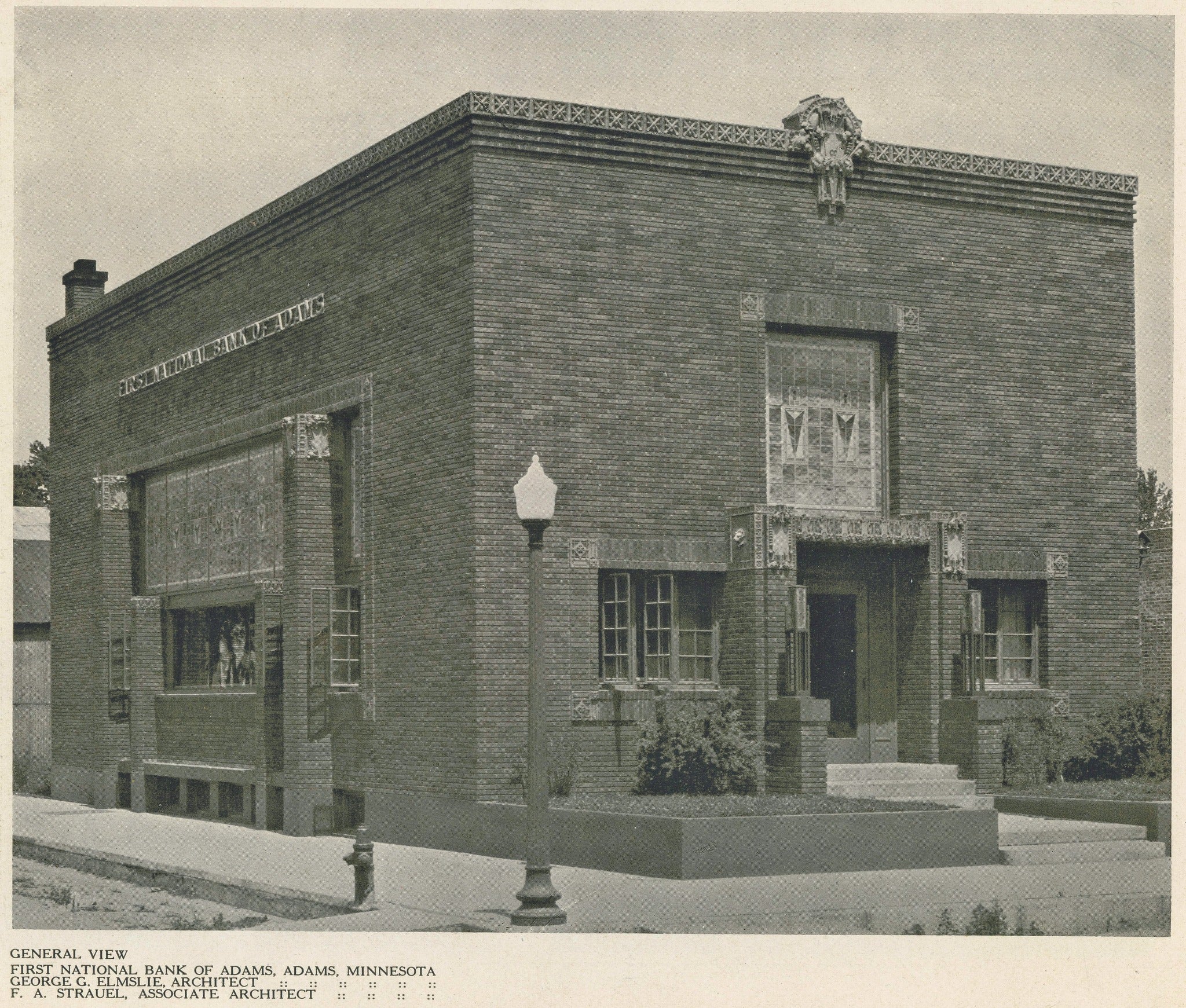 november 1927 western architect lithographic plates of purcell and elmslie’s first national bank (1920), located at 322 west main street, adams, mn.