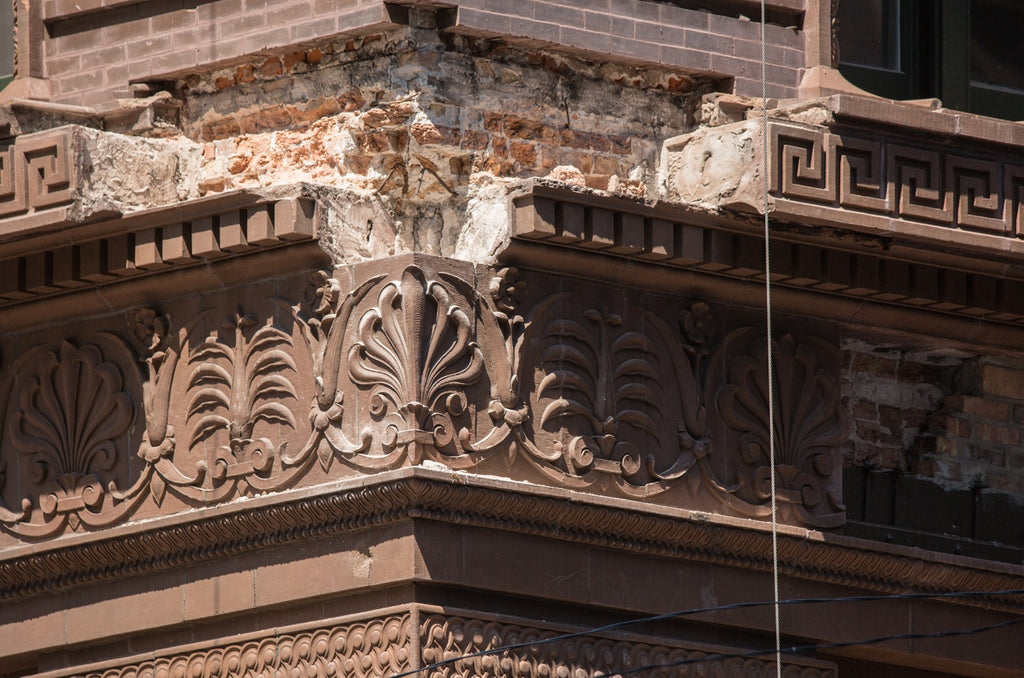 faithfully recast martin roche-designed marquette building terra cotta panel fabricated for building's restoration in 2019