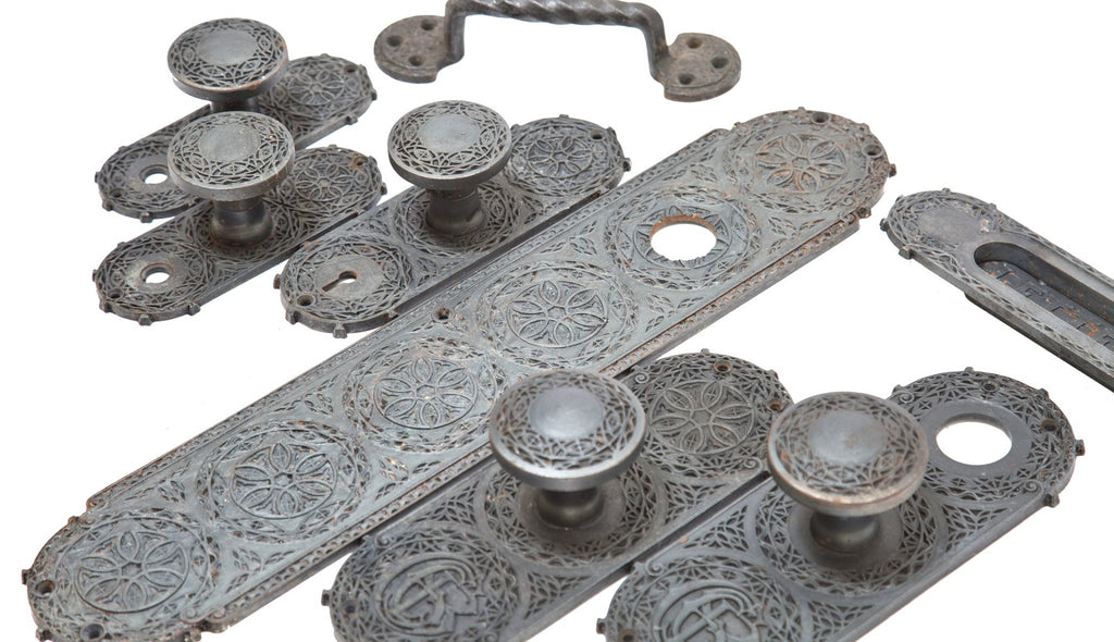 original louis h. sullivan-designed ornamental cast iron chicago stock exchange monogrammed backplate with matching doorknob