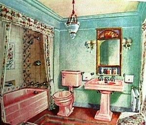 original and highly sought-after late 1930's american art deco streamlined style pink porcelain or vitreous enameled cast iron interior residential lavatory sink with pedestal base