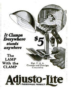 rare early 20th century "new old stock" antique american industrial clamp-on brass "adjusto-lite" single light fixture with rolled rim brass parabolic shade