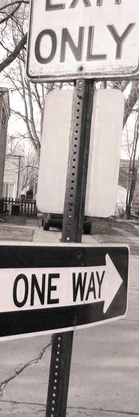 vintage american industrial single-sided heavy gauge steel "exit only" chicago city street sign with deeply embossed black enameled lettering