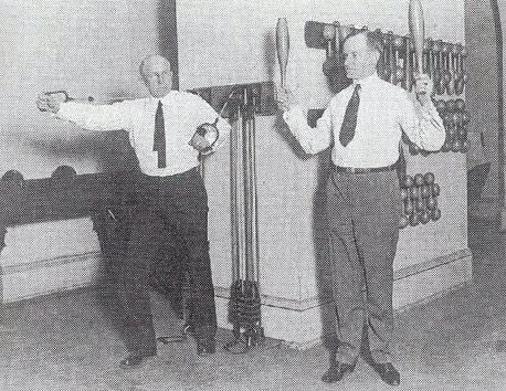 two matching original solid maple wood chicago athletic association building gymnasium exercise turned and tapered wood barbells with exceptional patina