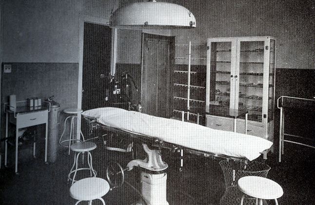 all original early 1920's american medical three-tier hospital operating room rolling supply cart with plate glass shelves