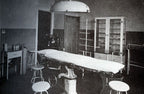 all original early 1920's american medical three-tier hospital operating room rolling supply cart with plate glass shelves