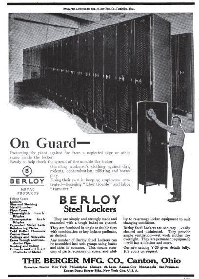 one of three matching c. 1919-1925 antique american industrial oversized heavily compartmentalized green painted riveted joint freestanding steel locker from a chicago factory