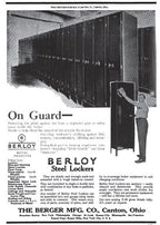 one of three matching c. 1919-1925 antique american industrial oversized heavily compartmentalized green painted riveted joint freestanding steel locker from a chicago factory