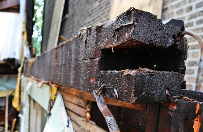oversized circular-sawn 19th century decommissioned chicago balloon frame old growth pine wood structural sill plate beam segment with a hand-chiseled tenon