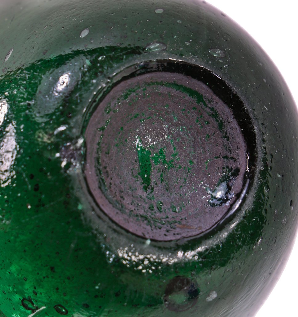 exceptional rare and original mid-nineteenth century dark emerald green iron pontiled ten pin shaped soda bottle manufactured for boston bottler luke beard.