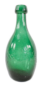 exceptional rare and original mid-nineteenth century dark emerald green iron pontiled ten pin shaped soda bottle manufactured for boston bottler luke beard.