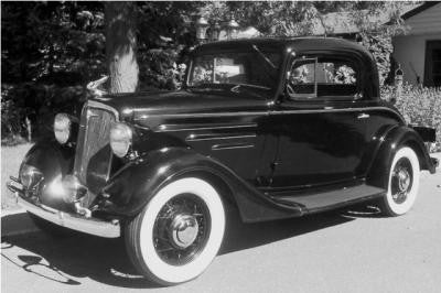 original c. 1930's antique american art deco streamlined style chrome-plated cast aluminum machine era chevy opera coupe figural automobile hood ornament or radiator cap