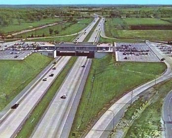 original state-issued original c. 1960's single-sided die cut aluminum illinois state tollway sign with large directional arrow
