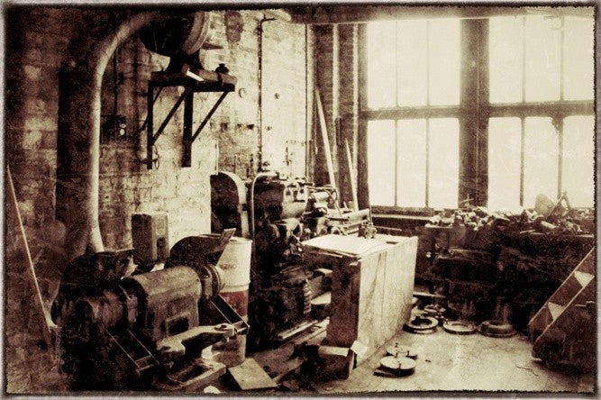 unique repurposed vintage american industrial electrified "unilet" table or desk lamp with intact caged ruby red glass globe