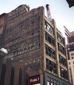 museum-quality original hoops building luxfer prism glass exterior showroom window mullion with repeating geometric flower motif