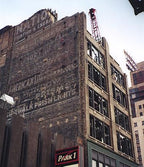strongly geometric exterior 1929 hoops building cast iron luxfer prism glass showroom second floor mullion segment