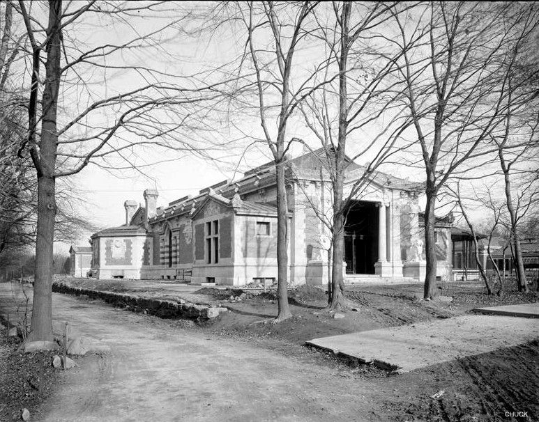 faithfully reproduced buff-colored oversized ornamental terra cotta lion panel replicated during restoration of the beaux-arts bronx zoo lion house