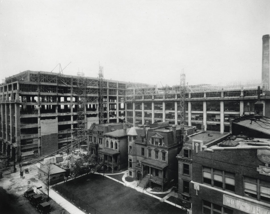historically important glazed polychrome ornamental terra cotta r.r. donnelley printing plant exterior facade shield with open book and crown