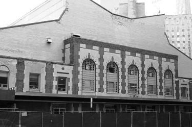 large quantity of matching c. 1940's vintage american industrial green porcelain enameled cbs studios pendant lights
