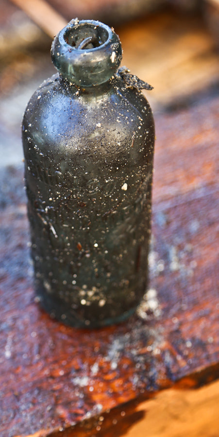 original and completely intact c. 1880's attic mint light aqua hutchinson style blobtop soda bottle manufactured for the consolidated bottling co., in chicago, il.