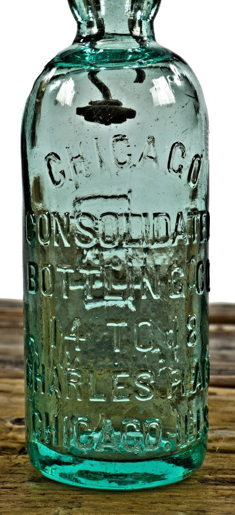 original and completely intact c. 1880's attic mint light aqua hutchinson style blobtop soda bottle manufactured for the consolidated bottling co., in chicago, il.