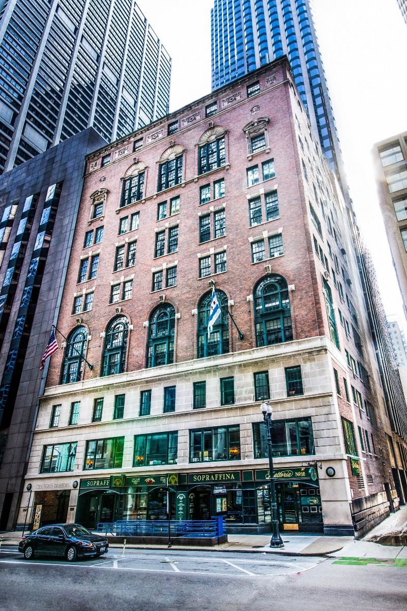 one of two early 20th century interior cast bronze monogrammed covenant club building doorknobs