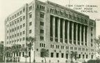pair of matching unusually-shaped neo classical style ornamental cast bronze interior wall-mount cook county criminal courts building wall sconces
