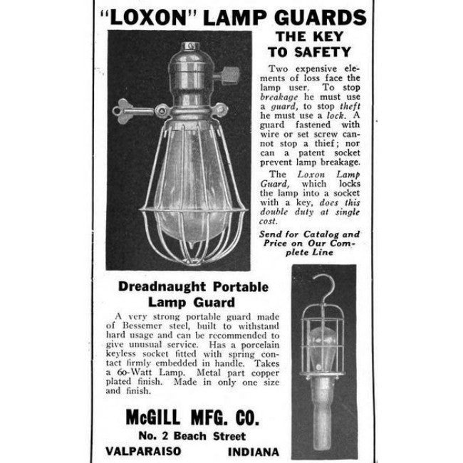 early 1920's antique american industrial portable "trouble light" or lamp guard with a refinished finely turned maple wood handle and copper-plated cage