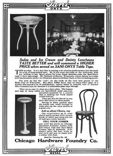 early 20th century tapered and fluted ornamental cast iron pub table pedestal base with brushed metal finish