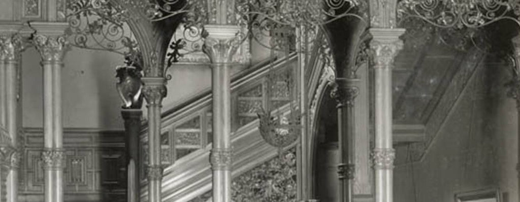 well documented 19th century museum-quality original varnished quartered oak wood and ornamental wrought iron potter palmer mansion angled staircase railing