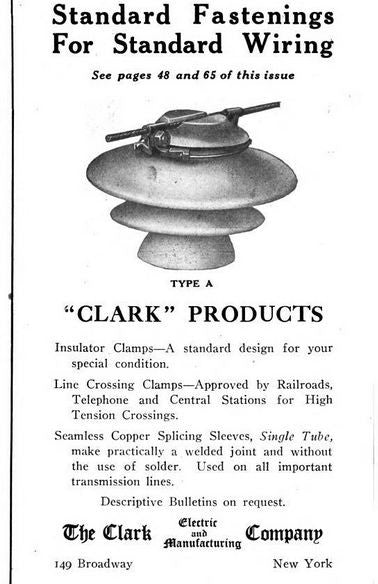 pair of vintage original american industrial reddish-brown glazed heavy duty suspension type transmission line insulators with cast iron bracket hoods and eye hooks