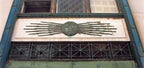 very rare c. 1920's american art deco cast bronze western telegraph company building exterior facade ornament featuring a globe flanked by lightning bolts
