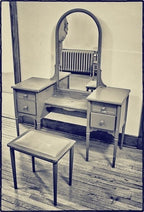 original c. 1930's completely refinished pressed and folded turned and tapered brushed steel "simmons" vanity with original tilting arch top mirror