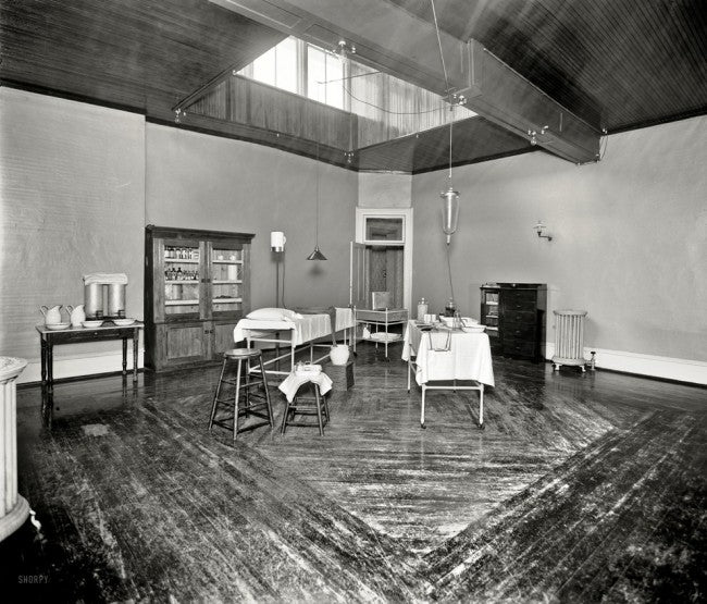 original and largely intact c. 1917-20 american medical freestanding hospital operating room workstation with encased cabinet for the storage of dressings