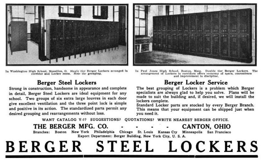 one of three matching c. 1919-1925 antique american industrial oversized heavily compartmentalized green painted riveted joint freestanding steel locker from a chicago factory
