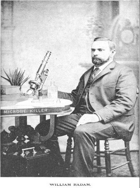 rare late 19th century antique american medical dark amber or brown glass "radam's microbe killer" embossed medicinal bottle with tooled plain lip