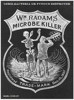 rare late 19th century antique american medical dark amber or brown glass "radam's microbe killer" embossed medicinal bottle with tooled plain lip