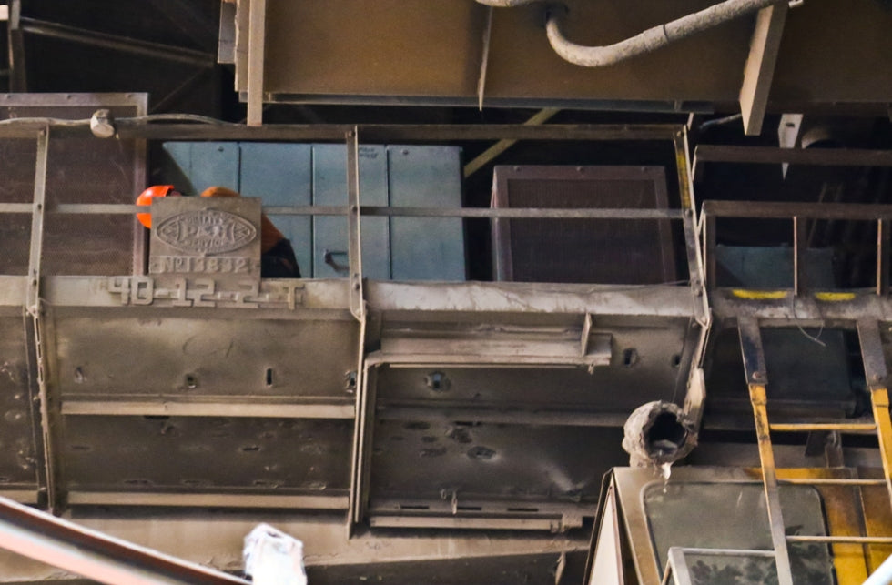 late 1940's robust all-welded joint custom built distressed blue painted solid steel four-legged american industrial foundry table with circular-shaped top