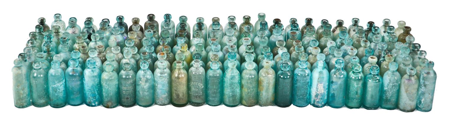 enormous lot of all original late nineteenth century aqua blue and green hutchinson style blobtop soda and mineral water bottles manufactured for various bottlers and dug in chicago