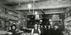 rare and highly sought after nicely aged oversized c. 1905-1910 interior chicago dry goods store 4-arm tubular brass ceiling fixture with original canopy and mica sockets