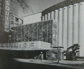 historically important gargantuan electrically animated exteiror chicago esquire theater building facade vertical neon sign