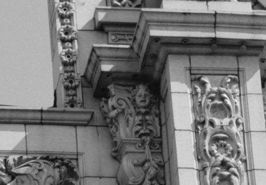 historically important largely intact documented museum-quality c. 1926 eichenbaum-designed granada theater facade white glazed terra cotta cherub head fragment with allover crazing