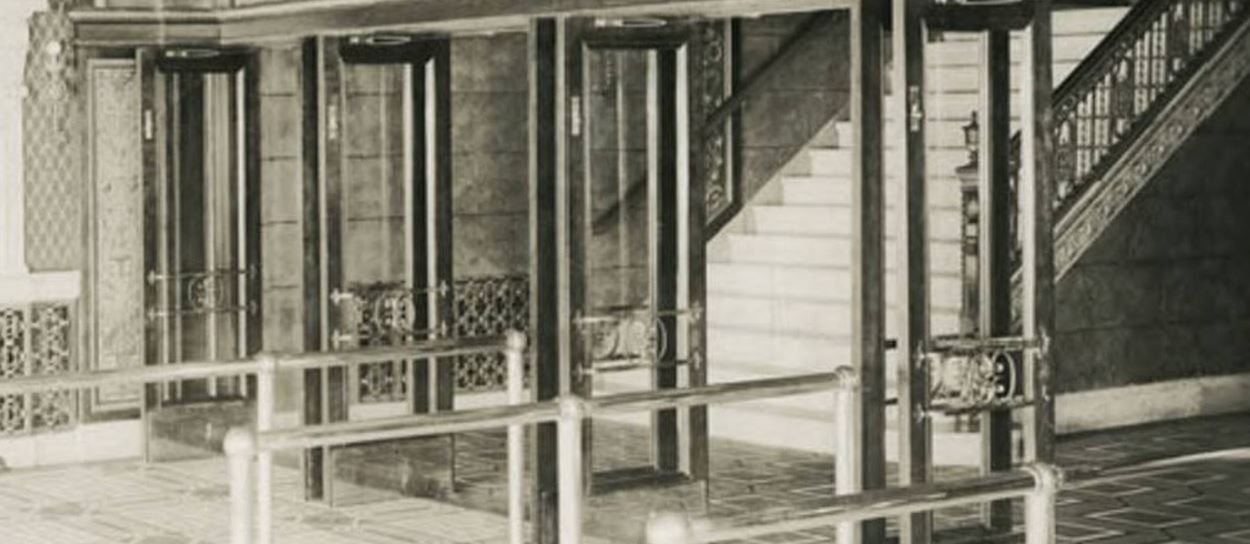 original 1929 spanish revival style ornamental wrought iron capitol theater building entrance door push bar